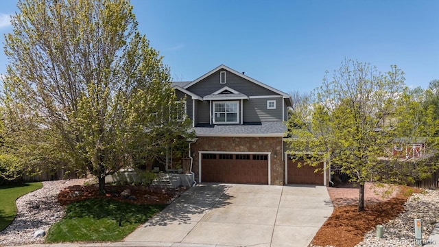 4815 Lucille Ct, Loveland, CO 80537 - view of front of property with an attached garage and driveway