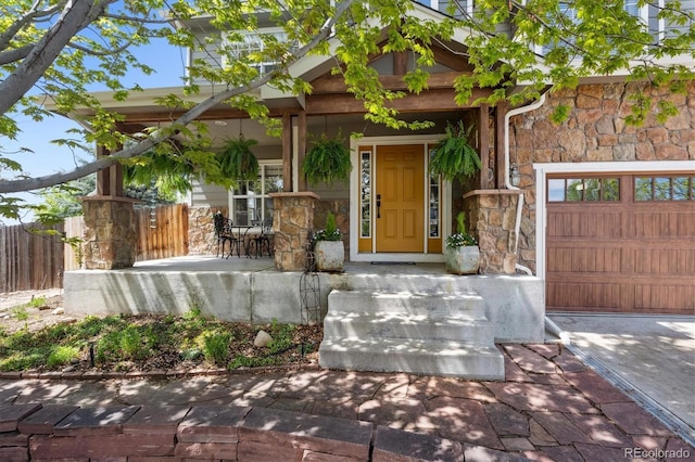 4815 Lucille Ct, Loveland, CO 80537 - doorway to property with stone siding and a porch