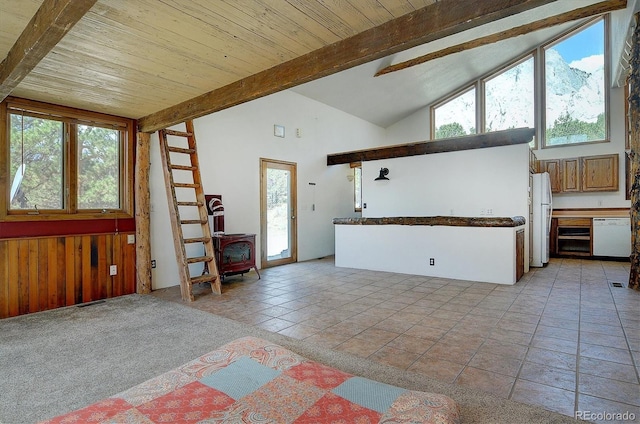 16715 Shadow Ln, Nathrop, CO 81236 - living room featuring a wood stove, beam ceiling, healthy amount of natural light, wood ceiling, and high vaulted ceiling