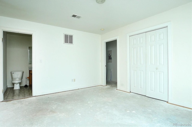 16715 Shadow Ln, Nathrop, CO 81236 - unfurnished bedroom with concrete flooring, a closet, ensuite bath, and baseboards