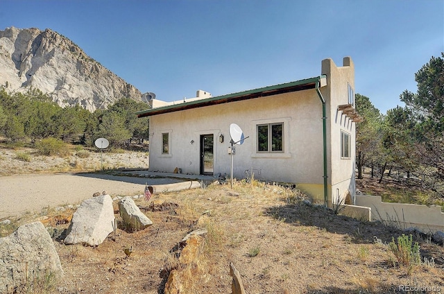 16715 Shadow Ln, Nathrop, CO 81236 - back of property featuring stucco siding and a mountain view