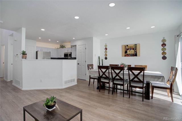 interior space with light hardwood / wood-style flooring