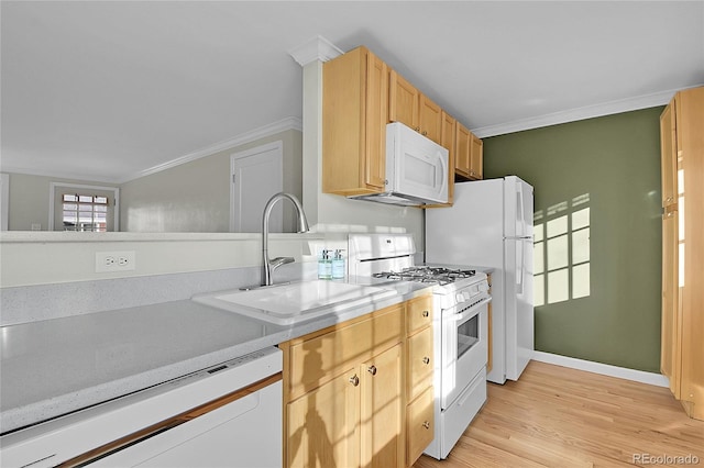 kitchen featuring white appliances, crown molding, sink, light hardwood / wood-style flooring, and light brown cabinetry