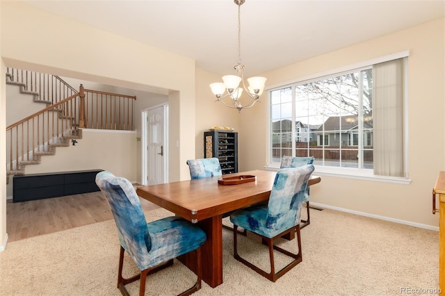 4814 S Upham Ct, Littleton, CO 80123 - dining space featuring stairs, a chandelier, beverage cooler, carpet, and wood finished floors