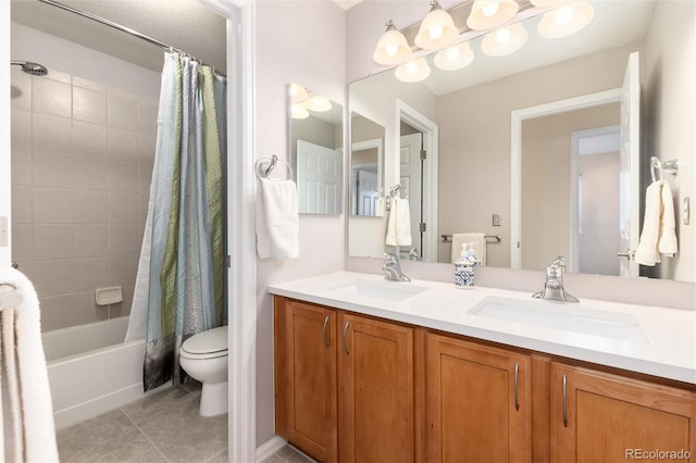 4814 S Upham Ct, Littleton, CO 80123 - full bathroom featuring double vanity, tile patterned flooring, and shower / tub combo with curtain