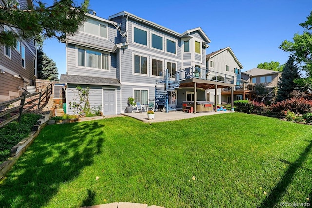 4814 S Upham Ct, Littleton, CO 80123 - back of property featuring a hot tub, a patio area, stairway, and a wooden deck