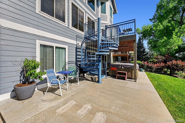 4814 S Upham Ct, Littleton, CO 80123 - view of patio featuring a hot tub, stairway, and a deck