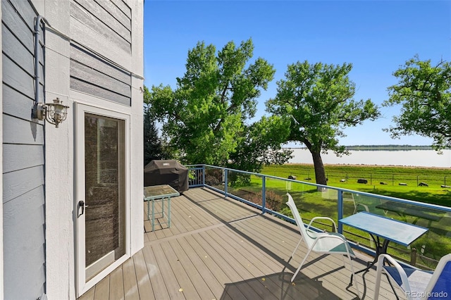 4814 S Upham Ct, Littleton, CO 80123 - wooden deck featuring a water view