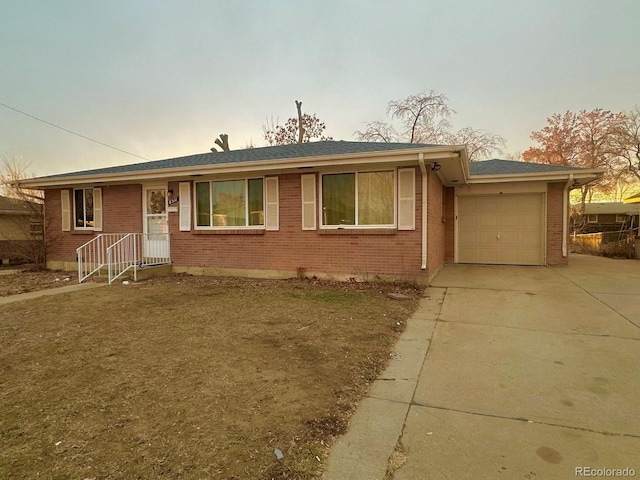 ranch-style home with a garage