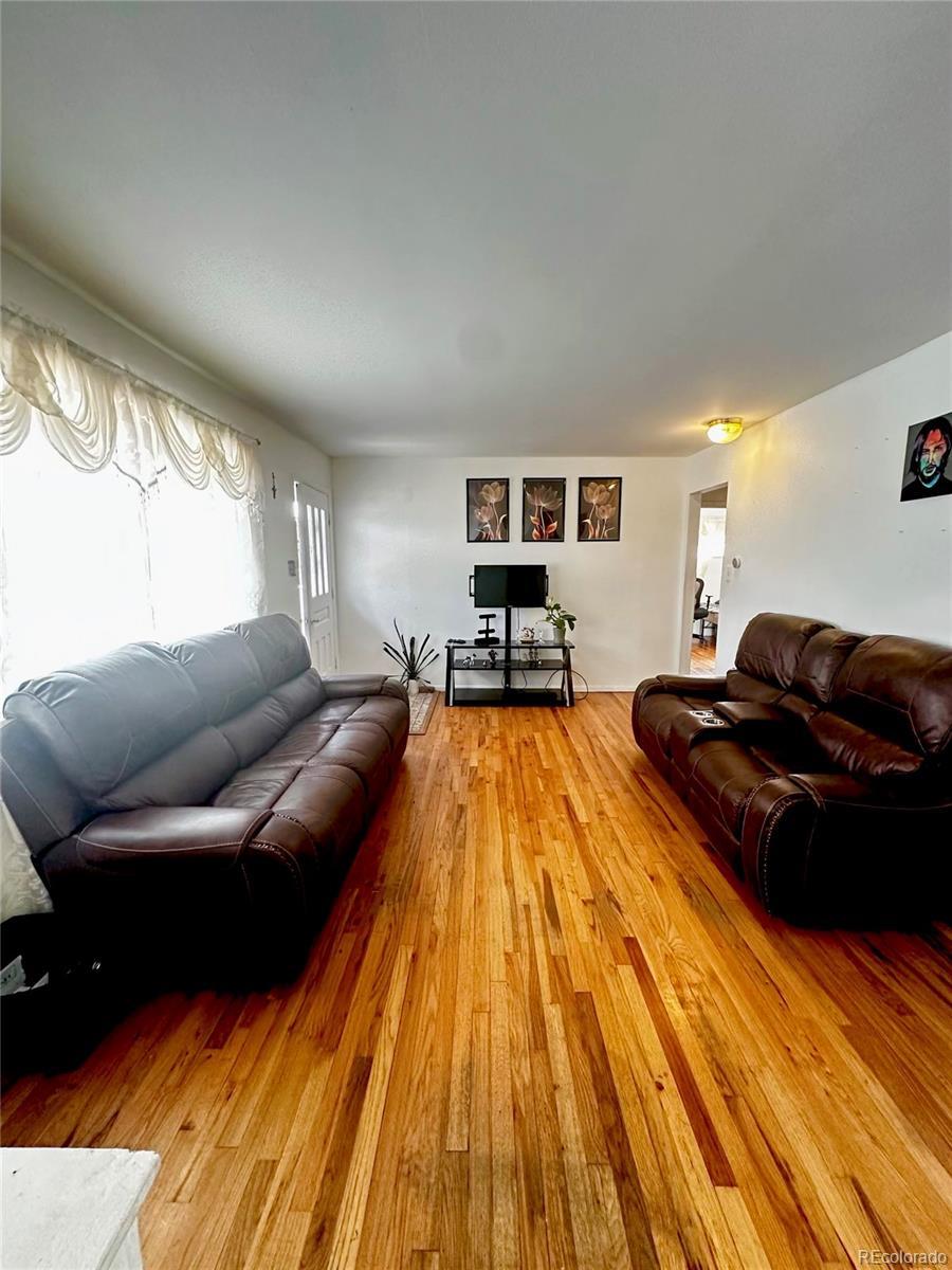 living room with hardwood / wood-style floors