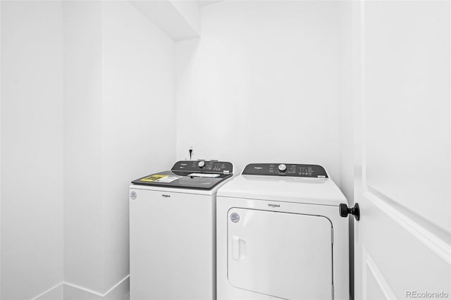 laundry area featuring separate washer and dryer