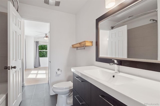 11 W Ellsworth Ave Unit 22, Denver, CO 80223 - full bathroom featuring toilet, tile patterned floors, vanity, a ceiling fan, and a shower