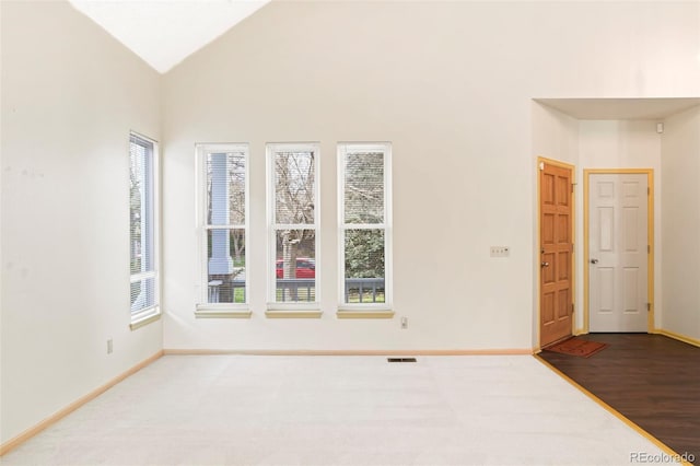 14084 E Hampden Pl, Aurora, CO 80014 - unfurnished room with a wealth of natural light, visible vents, and baseboards