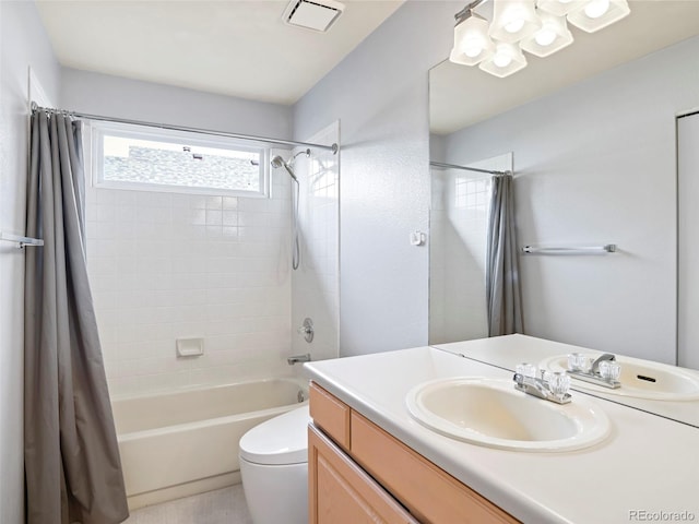 14084 E Hampden Pl, Aurora, CO 80014 - bathroom featuring shower / bath combination with curtain, toilet, visible vents, and vanity