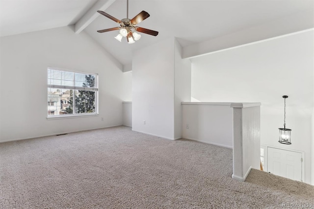 unfurnished living room with light carpet, beam ceiling, high vaulted ceiling, and ceiling fan