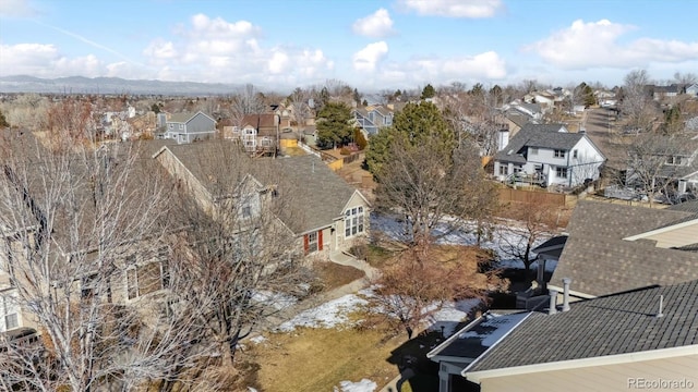 birds eye view of property featuring a mountain view