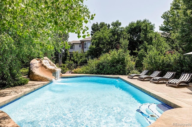 outdoor pool featuring a patio area