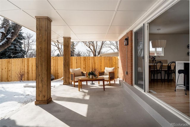 view of snow covered patio