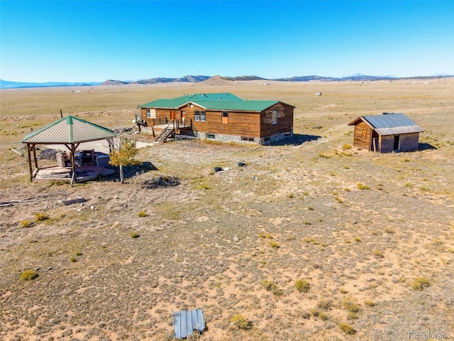 6558 Rio Blanco Rd, Hartsel, CO 80449 - overview of rural landscape with a mountain backdrop