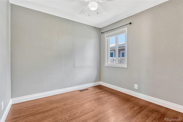 unfurnished room featuring ceiling fan and wood-type flooring