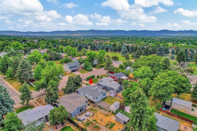 birds eye view of property featuring a mountain view