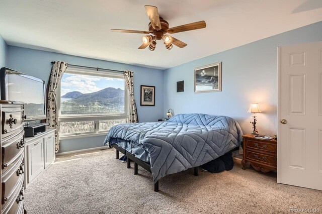 557 Highpoint Cir, Black Hawk, CO 80422 - bedroom featuring light carpet and a ceiling fan
