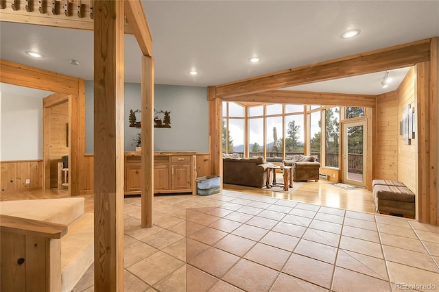 29266 S Sunset Trl, Conifer, CO 80433 - dining area with wood walls, healthy amount of natural light, recessed lighting, wainscoting, and light tile patterned floors