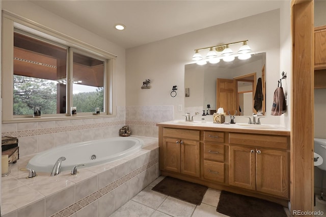 29266 S Sunset Trl, Conifer, CO 80433 - bathroom featuring double vanity, a whirlpool tub, and tile patterned floors