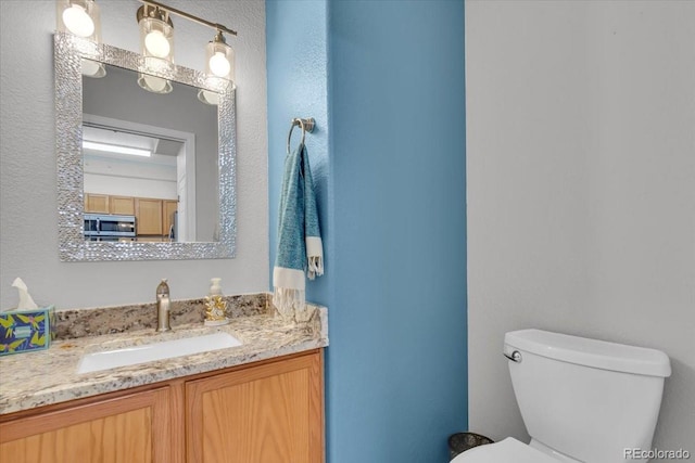 9758 Laredo St Unit 35B, Commerce City, CO 80022 - half bath with toilet and vanity