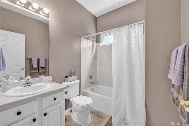 2938 S Zeno Way, Aurora, CO 80013 - bathroom with a textured wall, vanity, shower / bath combination with curtain, and tile patterned floors