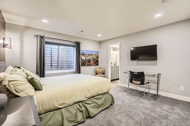 carpeted bedroom with recessed lighting, visible vents, connected bathroom, and baseboards