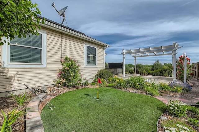 view of yard featuring fence, a pergola, and a patio