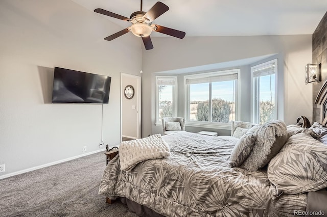 bedroom featuring ceiling fan, baseboards, vaulted ceiling, and carpet flooring