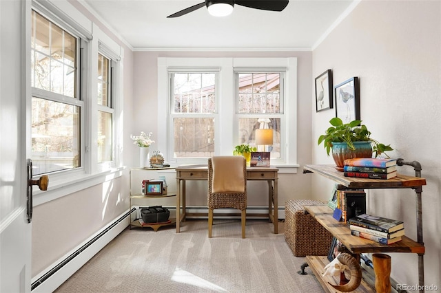 carpeted home office with a ceiling fan, baseboard heating, and crown molding