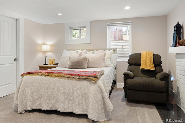 carpeted bedroom with recessed lighting