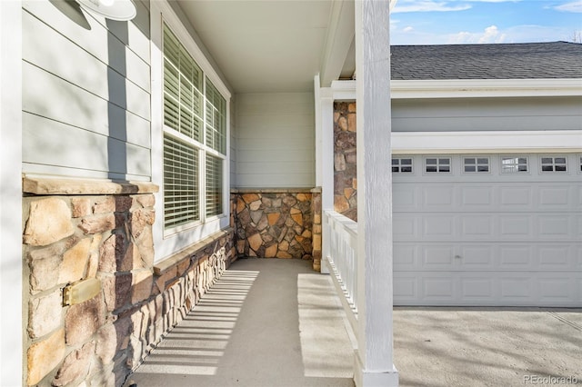 view of exterior entry featuring a garage