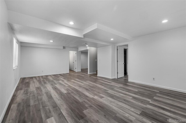 basement featuring wood-type flooring