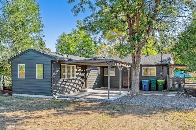 rear view of house with a patio