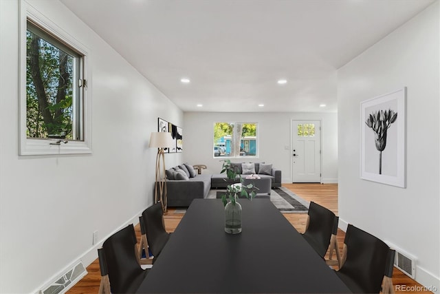 dining space featuring hardwood / wood-style flooring