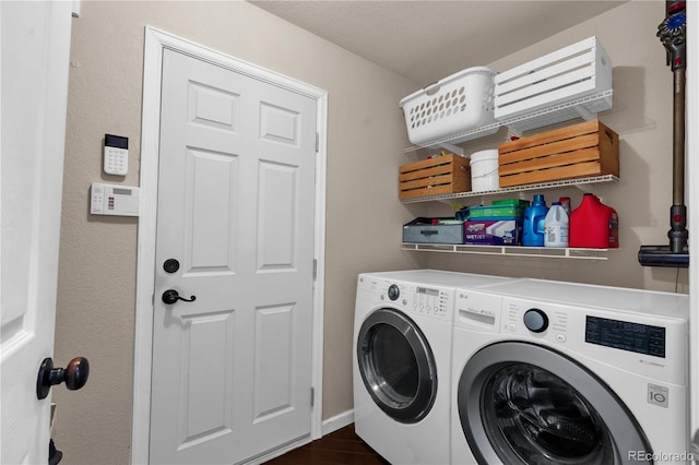 10087 E Hawaii Pl, Aurora, CO 80247 - laundry area featuring washing machine and clothes dryer and dark wood-style floors