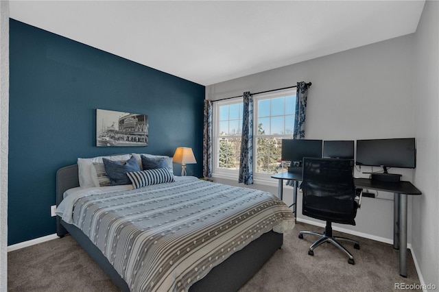 10087 E Hawaii Pl, Aurora, CO 80247 - carpeted bedroom featuring baseboards and an accent wall