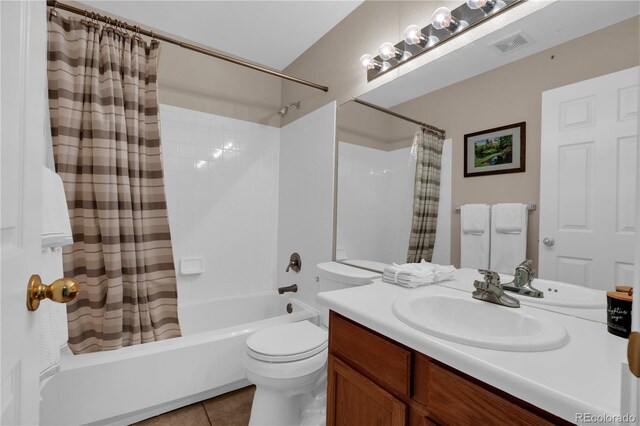 10087 E Hawaii Pl, Aurora, CO 80247 - bathroom with vanity, shower / tub combo with curtain, and tile patterned flooring