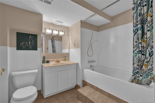 10087 E Hawaii Pl, Aurora, CO 80247 - full bath featuring shower / bath combo with shower curtain, vanity, and tile patterned floors
