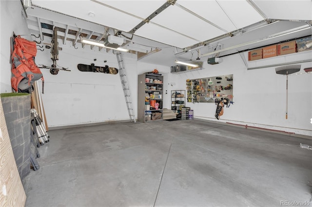 10087 E Hawaii Pl, Aurora, CO 80247 - garage with a workshop area and a garage door opener