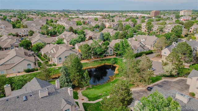 10087 E Hawaii Pl, Aurora, CO 80247 - aerial perspective of suburban area with a large body of water