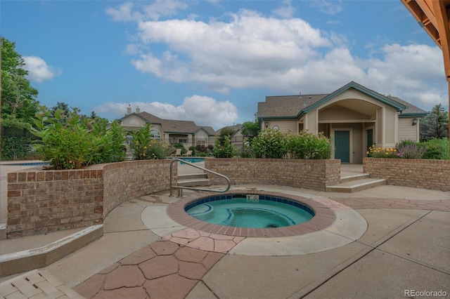 10087 E Hawaii Pl, Aurora, CO 80247 - view of pool featuring a hot tub and a patio