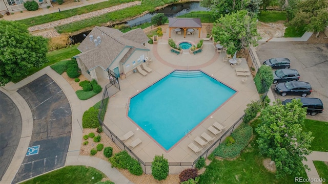 10087 E Hawaii Pl, Aurora, CO 80247 - community pool featuring a gazebo and a patio