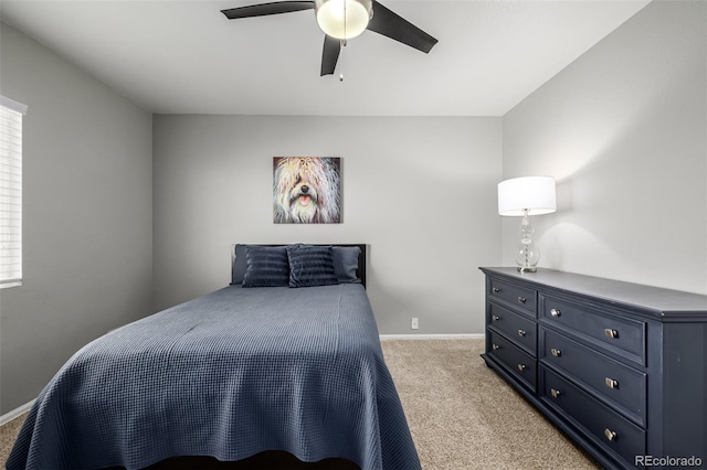 9758 Laredo St Unit 37C, Commerce City, CO 80022 - bedroom with light colored carpet, a ceiling fan, and baseboards