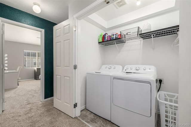 9758 Laredo St Unit 37C, Commerce City, CO 80022 - clothes washing area with separate washer and dryer, light colored carpet, and baseboards