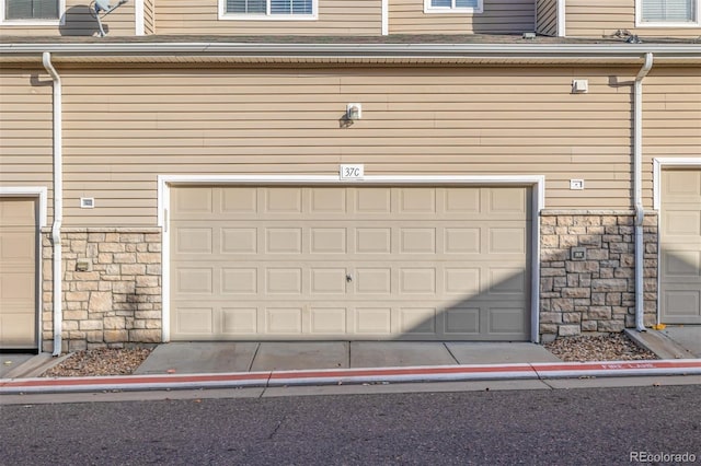 9758 Laredo St Unit 37C, Commerce City, CO 80022 - view of garage